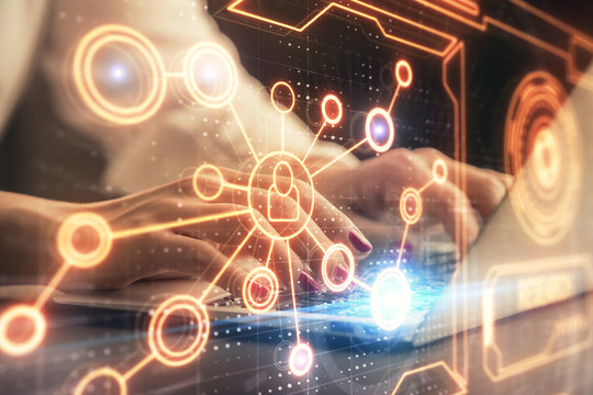 Double exposure of woman hands typing on computer and social network theme hologram drawing. People media concept.