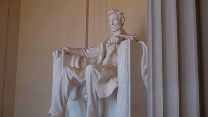 President Lincoln sitting in a chair - the famous Lincoln Memorial in Washington DC