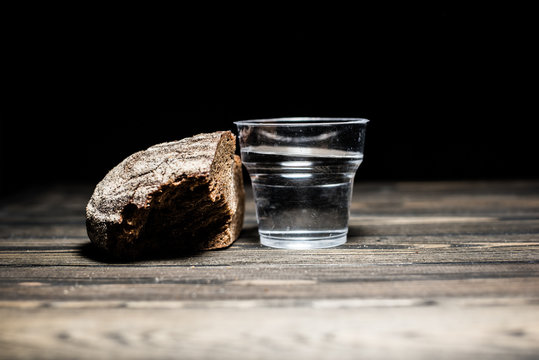 bread with water on a dark background