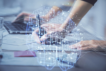Multi exposure of woman hands working on computer and brain hologram drawing. Ai concept.