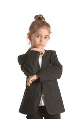 Portrait of little businesswoman on white background