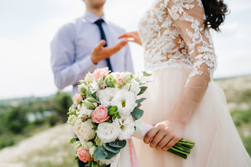 elegant wedding bouquet of fresh natural flowers