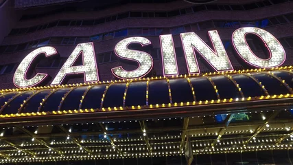 Tuinposter Casino neon lights at Las Vegas Downtown © 4kclips