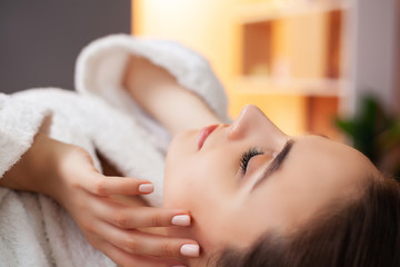 Obraz na płótnie Canvas Cute woman getting spa treatments at beauty studio
