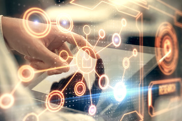 Double exposure of man's hands holding and using a phone and social network theme drawing.