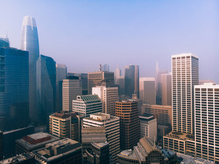 Obraz premium Cityscape view of midtown of megapolis with commercial real estate and apartments, panorama of modern city with high architectural buildings and skyscraper in financial business district with offices