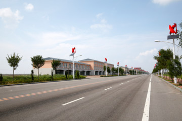 Beautiful roads and street lamps against a background of blue sky and white clouds