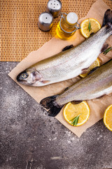 Raw uncooked trout with lemon