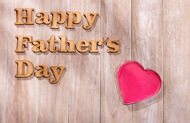 Happy Father's Day text on rustic white wooden background. greeting card concept.