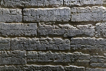 texture old brick wall laid out at the beginning of the 18th century. Beautiful antique texture can be used as background