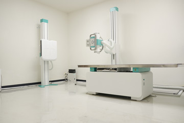 x-ray machine at the hospital, An irradiated radiation emitting device to the patient.