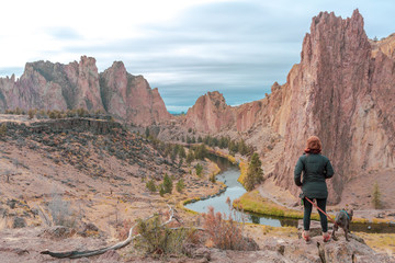 Obraz premium Woman Pondering River and Mountains