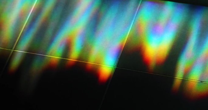 Light glow refraction color spectrum vivid wave flickering on the floor