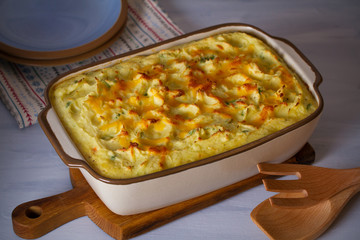 Creamy fish pie or fisherman's pie - traditional British and Irish dish. horizontal image