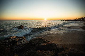 Ocean beach during a beautiful sunset.