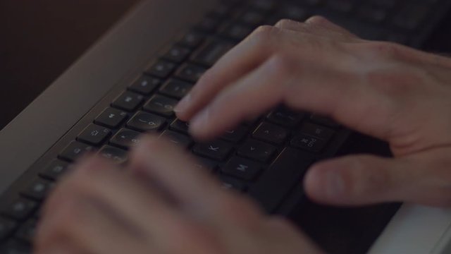 Hands typing on Logitech Craft keyboard (no logo)