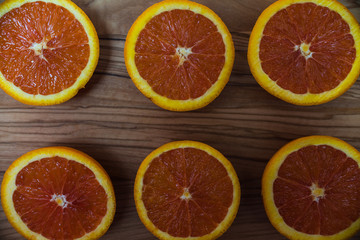 Close Up of Fresh Oranges on wooden background