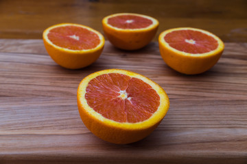 Close Up of Fresh Oranges on wooden background