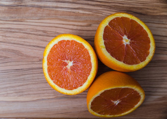 Close Up of Fresh Oranges on wooden background