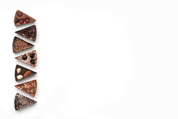 Diferent Piece Handmade chocolate with nuts, dried fruits, seeds