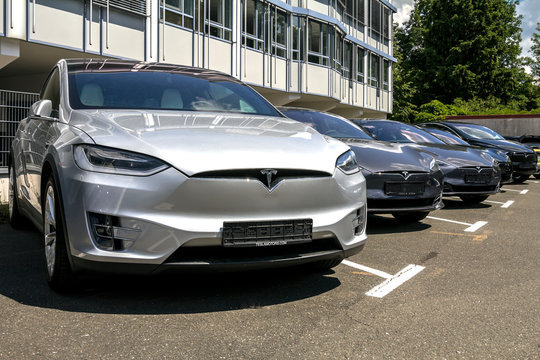 Nurnberg, Germany : Tesla Motors Service Center With Multiple Luxury Tesla Cars Inside. Tesla Is An American Company That Designs, Manufactures, And Sells Electric Cars