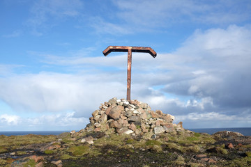 Metal Tau Cross on a Cairn Overlooking Tory Island, County Donegal, Ireland © DorSteffen