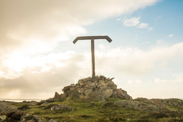 Metal Tau Cross on a Cairn Overlooking Tory Island, County Donegal, Ireland © DorSteffen