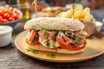 cured ham and pesto sandwich.