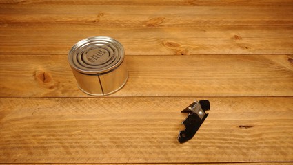Tin can opener old background