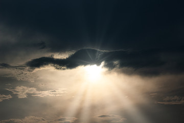 sun rays and clouds