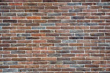 Weathered of old vintage brick wall background and texture