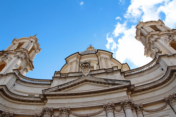 Sunny view of Piazza Navona with the blue sky and clouds in Rome, Italy