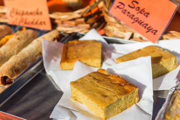 Paraguayan dish called sopa paraguaya at a street food market