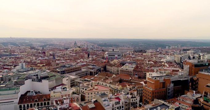 Aerial 4K footage of the city center of Madrid, Spain.Architecture and landmarks of Madrid. Cityscape of Madrid,Popular tourist attraction at Barrio Centro.Gran Via street and Royal Theatre.
