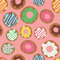 Vector seamless repeat pattern with colourful colorful donuts doughnuts with sprinkles and icing tossed on a peach pink background