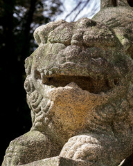 Stone carving at Itsukushima island popularly known as Miyajima meaning shrine Island