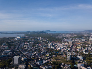aerial view of the city around the picturesque mountains at sunrise