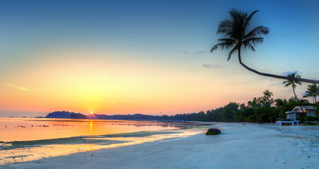 Fototapeta na wymiar Panorama of Golden Tropical Beach Sunrise on Bintan Island, Indonesia