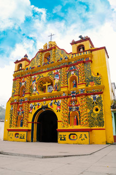 The picturesque church of El Calvario is located in San Andres Xecul, Totonicapan Guatemala.Built on the XVII century its architecture and details of the facade represent saints, animals, fruits