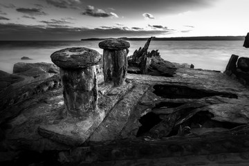 Black and white photo of a shipwreck at sunset, Sydney Australia