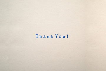 a THANK YOU! word stamped on a piece of paper.