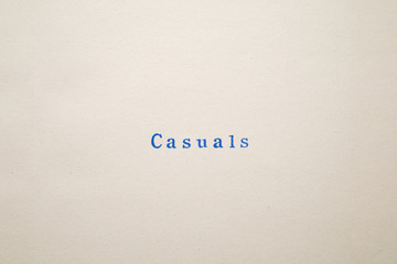 a CASUALS word stamped on a piece of paper.