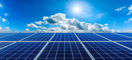 Photovoltaic solar power panel on sky background,green clean alternative energy concept. - obrazy, fototapety, plakaty