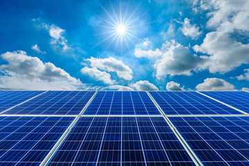 Photovoltaic solar power panel on sky background,green clean alternative energy concept.
