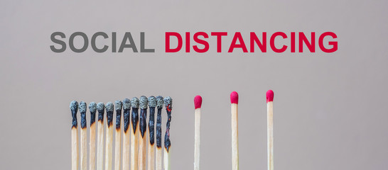 burnt out match sticks and gap distance showing preventative containing coronavirus pandemic with copy space for text. Stay at home, Quarantines and Social Distancing concept