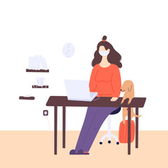 Stay home global concept. A woman is working at home on the laptop in a period of self isolation and social distancing during covid virus epidemic. The pet is very happy to spend the whole day with