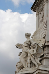 Statue Angels of the Truth at Victoria Memorial in front of Buckingham Palace, London, UK