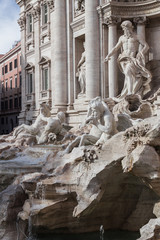 Fototapeta na wymiar Rome, the famous Trevi fountain, sculptures, fragments of the fountain