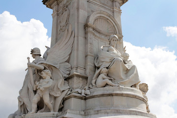 Statues of Motherhood and Angels of Justice at Victoria Memorial in front of Buckingham Palace,...