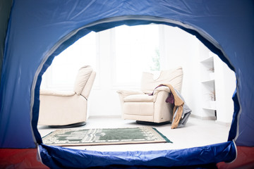 Legs in a tent outdoors